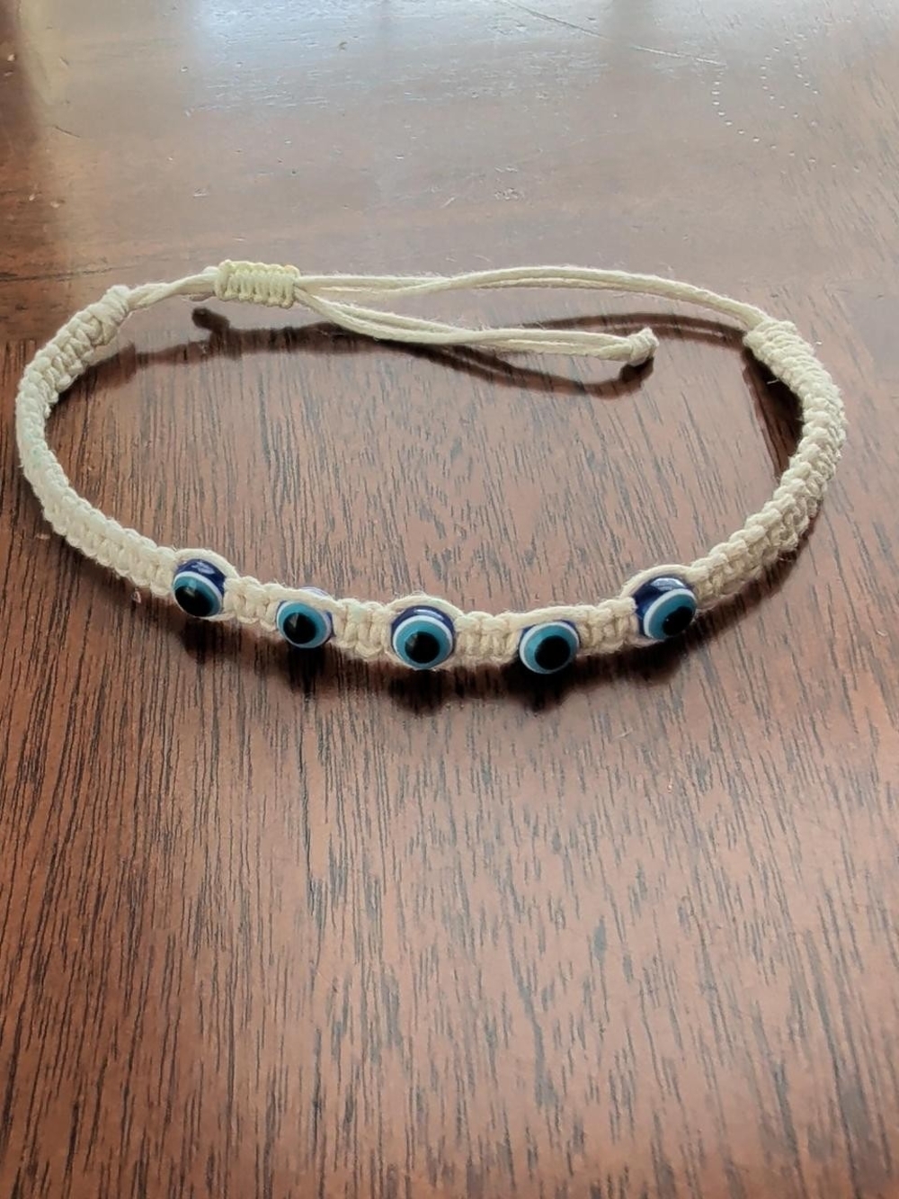 Cream Bracelet with Blue Evil Eye Beads